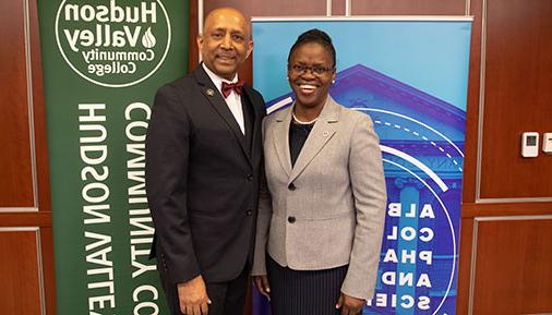 ACPHS President Toyin Tofade and HVCC President Roger Ramsammy 